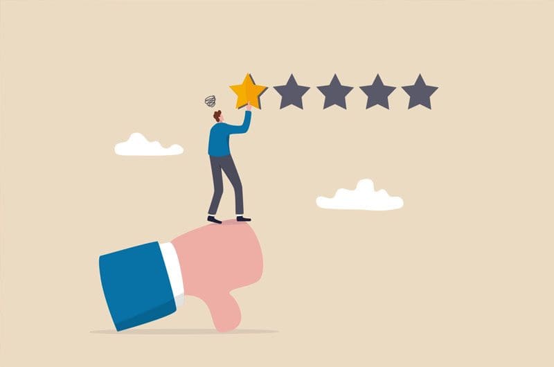 the-year-customer-experience-died a man is holding a hand with five stars on it